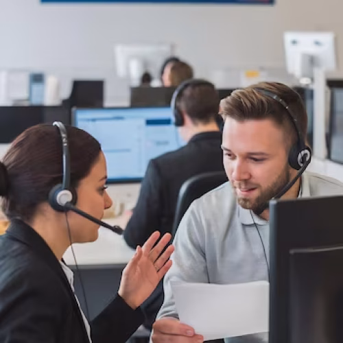 collaboration-woman-man-with-headset-call-center-client-help-showing-pc-coaching-i_1313853-170551