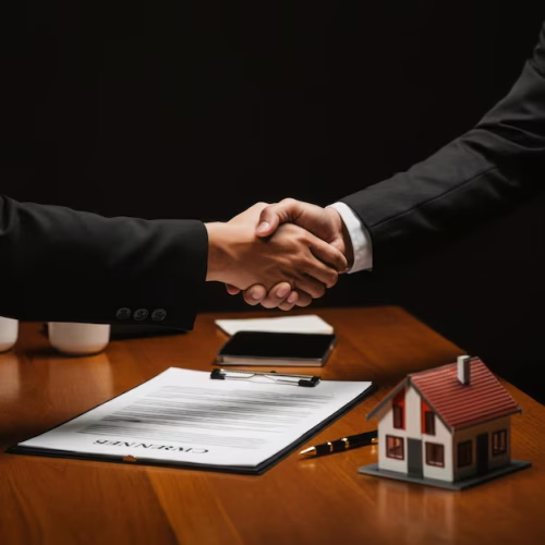 real-estate-agreement-handshake-with-house-model-documents_941011-3775